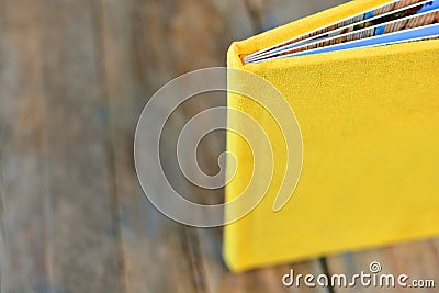 Photobook cover on a wooden background Stock Photo