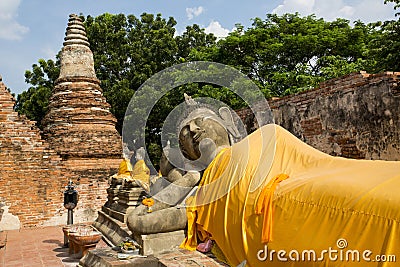 A Photograph of ancient pagoda with statue of Reclining Buddha Stock Photo