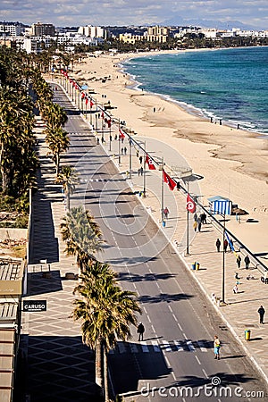 Photograph of the beach, the prpmenade and the main street on the beach at Sousse Editorial Stock Photo