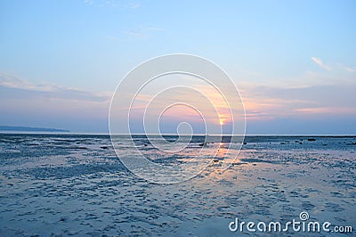 Sunrise with Golden Sun and Colorful Sky over Infinite Horizon and Ocean - Vijaynagar Beach, Havelock Island, Andaman, India Stock Photo