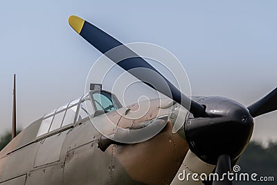 A photograph documenting the propeller and cockpit glass of an R Editorial Stock Photo