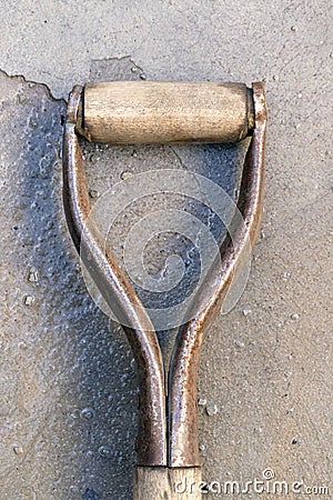 Close-up of old shovel or rake handle Stock Photo
