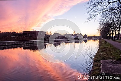 Serene Canal at Sunset Stock Photo