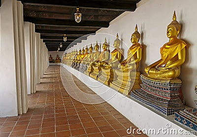 A photograph of row of statues of Buddha Stock Photo