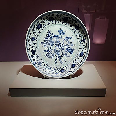 Ancient Chinese porcelain plate with flowers Editorial Stock Photo