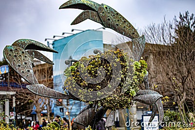 Photograph of the Topiary Crab Sculpture at pier 39 of the Fisherman's Wharf in San Francisco Bay. Stock Photo
