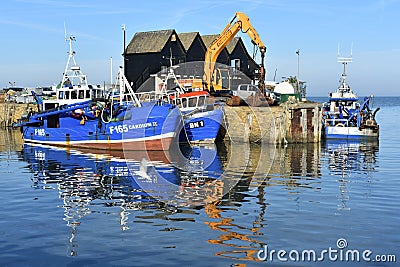 Whitstable Harbour reflections, Kent, UK Editorial Stock Photo