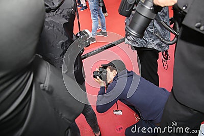 Photographer attends the screening Editorial Stock Photo