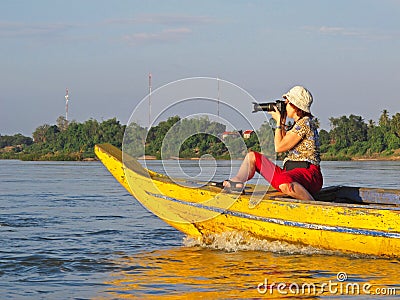 Photographer on boat Editorial Stock Photo