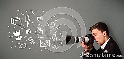 Photographer boy capturing white photography icons and symbols Stock Photo