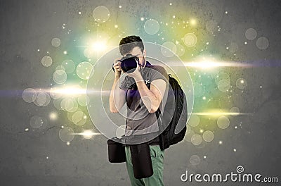 Photographer with flashing lights Stock Photo