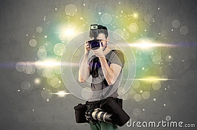 Photographer with flashing lights Stock Photo