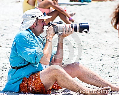 Photographer on Folly Beach, Charleston, SC Editorial Stock Photo