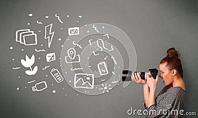 Photographer girl capturing white photography icons and symbols Stock Photo