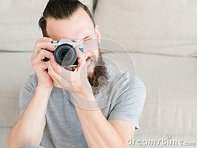 Photographer hobby lifestyle man camera look lens Stock Photo