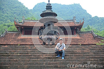 A photographer in Huong Pagoda - Vietnam Editorial Stock Photo