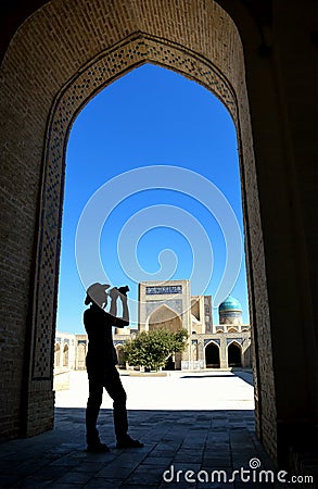 Photographer in the Kalyan Mosque Stock Photo