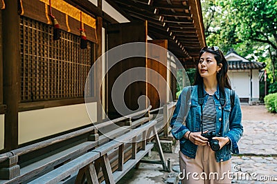 Photographer looking around the Japanese building Stock Photo