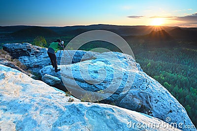 Photographer looks into the landscape and listen the silence Stock Photo