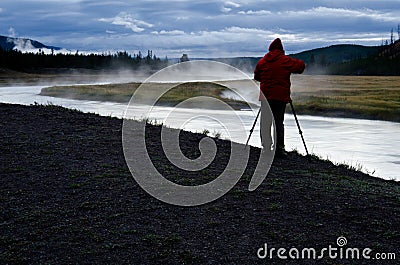 Photographer on Madison River in Yellowstone National Park Stock Photo