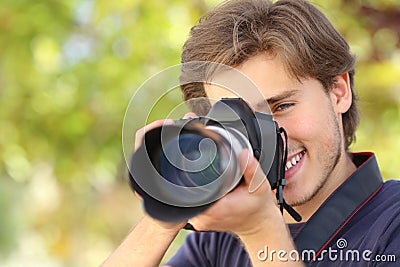 Photographer photographing and learning with a dslr digital camera Stock Photo