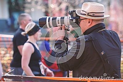 Photographer in running event at Seattle Center Editorial Stock Photo