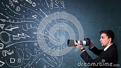 Photographer shooting images while energetic hand drawn lines an Stock Photo