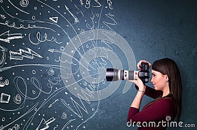 Photographer shooting images while energetic hand drawn lines an Stock Photo