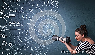 Photographer shooting images while energetic hand drawn lines an Stock Photo