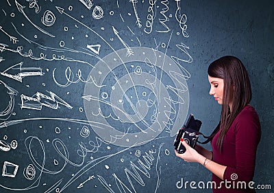 Photographer shooting images while energetic hand drawn lines an Stock Photo