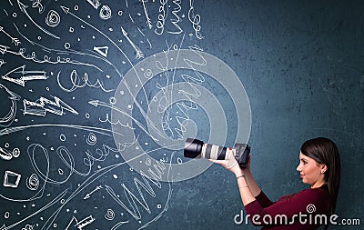 Photographer shooting images while energetic hand drawn lines an Stock Photo