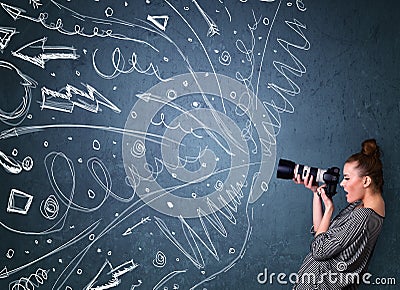 Photographer shooting images while energetic hand drawn lines an Stock Photo