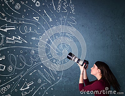 Photographer shooting images while energetic hand drawn lines an Stock Photo