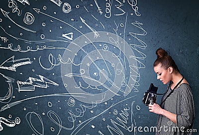 Photographer shooting images while energetic hand drawn lines an Stock Photo