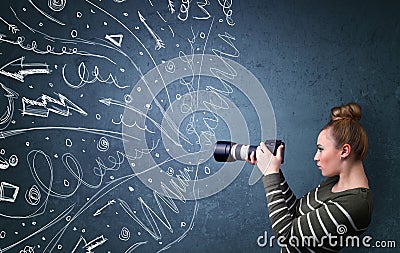 Photographer shooting images while energetic hand drawn lines an Stock Photo