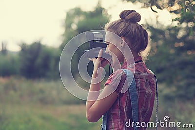 Photographer shooting outdoors Stock Photo