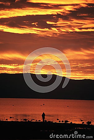 Photographer shooting sunrise Stock Photo