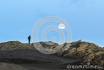 Photographer on Stokksnes cape Stock Photo