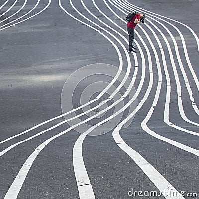 Photographer stripes on the ground in Superkilen, Copenhagen Editorial Stock Photo