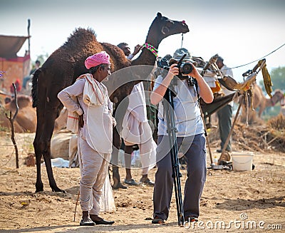 Photographer take pictures at the Pushkar Fair, India Editorial Stock Photo