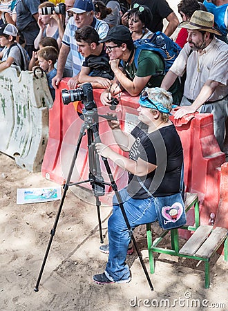 Photographer takes video of the action at the annual festival `Jerusalem Knights` Editorial Stock Photo