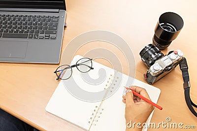 Photographer upload pictures online, Preparation of equipment Stock Photo