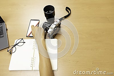 Photographer upload pictures online Stock Photo