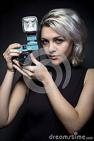 Photographer with Vintage Plastic Camera Stock Photo