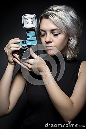 Photographer with Vintage Plastic Camera Stock Photo