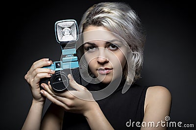 Photographer with Vintage Plastic Camera Stock Photo