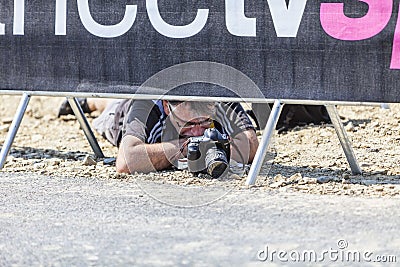 Photographer at Work - Tour de France Editorial Stock Photo