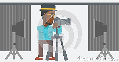 Photographer working with camera on a tripod. Vector Illustration