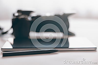 Photographer Workspace on white table, tablet and camera copy sp Stock Photo