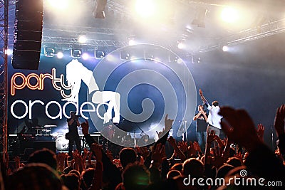 Photographers from party Oradea on stage at the Cargo concert at October fest in Oradea Romania Editorial Stock Photo